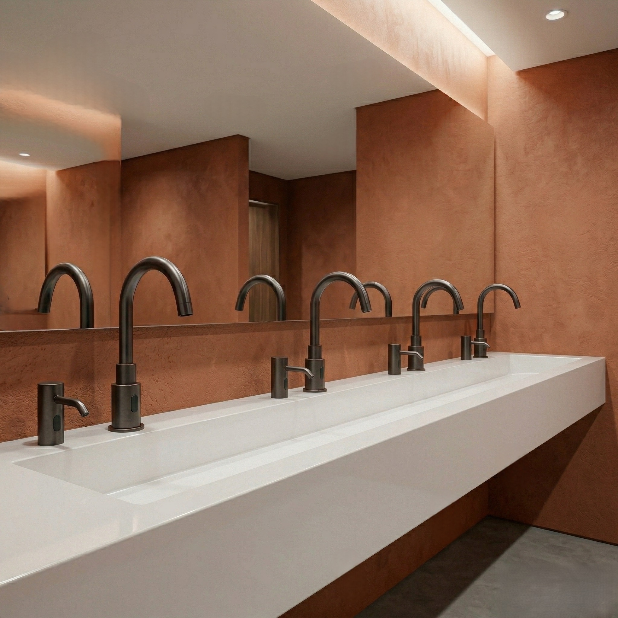 Commercial sensor faucet installation in a high-use restroom